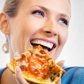 womanlaughingeatingpizza